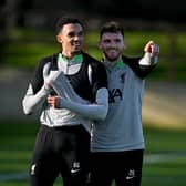 Liverpool pair Trent Alexander-Arnold and Andy Robertson. (Photo by Andrew Powell/Liverpool FC via Getty Images)