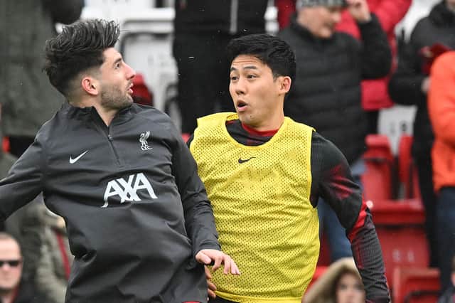 Liverpool pair Wataru Endo, right, and Dominik Szoboszlai. (Photo by John Powell/Liverpool FC via Getty Images)