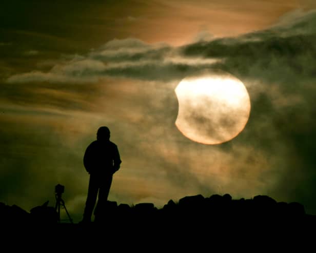 Stock photo by Toby Williams of the 2011 solar eclipse from Arthur's Seat.