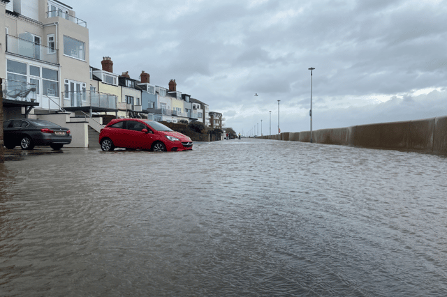 Flooding behind the sea wall. Image: Ed Barnes