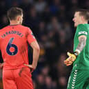  James Tarkowski and Jordan Pickford of Everton interact following defeat in the Premier League match between Chelsea FC and Everton FC at Stamford Bridge on April 15, 2024 in London, England. (Photo by Alex Pantling/Getty Images)