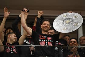 Xabi Alonso celebrates winning the Bundesliga title with Bayer Leverkusen.  (Photo by INA FASSBENDER/AFP via Getty Images)
