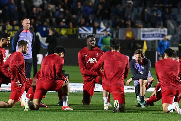 Liverpool's team warms up ahead of the UEFA Europa League quarter-final second leg football match between Atalanta BC and Liverpool FC at the Atleti Azzurri d'Italia Stadium in Bergamo, on April 18, 2024. (Photo by Isabella BONOTTO / AFP) (Photo by ISABELLA BONOTTO/AFP via Getty Images)