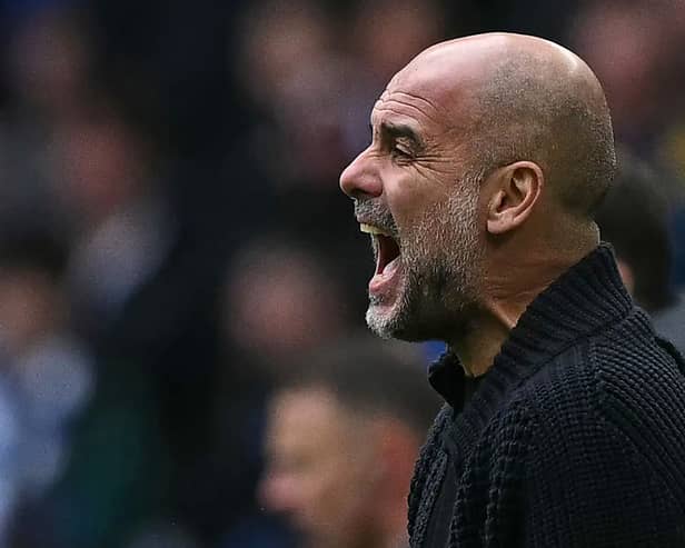 Man City boss Pep Guardiola. (Photo by BEN STANSALL/AFP via Getty Images)
