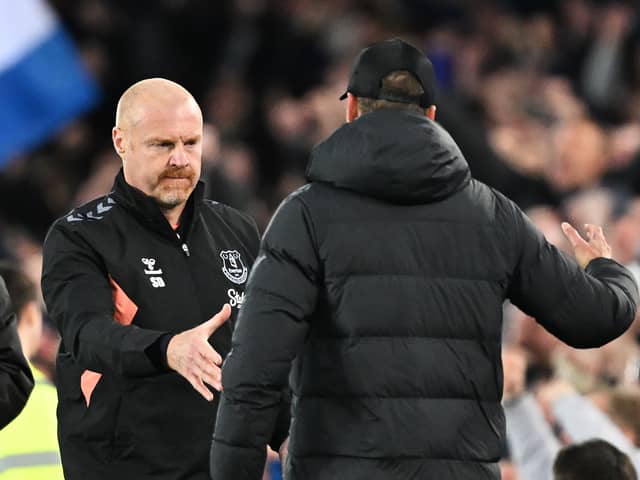 Sean Dyche, Manager of Everton, shakes hands with Jurgen Klopp, Manager of Liverpool, after the Premier League match between Everton FC and Liverpool FC at Goodison Park on April 24, 2024 in Liverpool, England. (Photo by Michael Regan/Getty Images)
