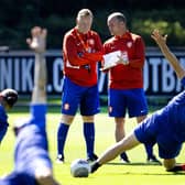 Dutch head coach Ronald Koeman and Dutch assistant coach Sipke Hulshoff (R) attend a training session of Dutch national team at the KNVB Campus in Zeist on September 5, 2023, ahead of the European Championship qualifying football match against Greece. (Photo by Olaf KRAAK / ANP / AFP) / Netherlands OUT (Photo by OLAF KRAAK/ANP/AFP via Getty Images)