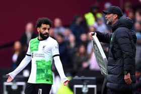 Mohamed Salah of Liverpool clashes with Jurgen Klopp, Manager of Liverpool, during the Premier League match between West Ham United and Liverpool FC at London Stadium on April 27, 2024 in London, England. (Photo by Justin Setterfield/Getty Images)