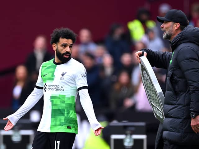Mohamed Salah of Liverpool clashes with Jurgen Klopp, Manager of Liverpool, during the Premier League match between West Ham United and Liverpool FC at London Stadium on April 27, 2024 in London, England. (Photo by Justin Setterfield/Getty Images)