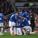 Idrissa Gueye of Everton celebrates scoring his team's first goal with teammates during the Premier League match between Everton FC and Brentford FC at Goodison Park on April 27, 2024 in Liverpool, England. (Photo by Lewis Storey/Getty Images)