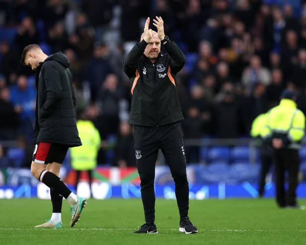 Sean Dyche, Manager of Everton, applauds the fans after the team's victory in the Premier League match between Everton FC and Brentford FC at Goodison Park on April 27, 2024 in Liverpool, England. (Photo by Lewis Storey/Getty Images)