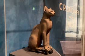 This bronze statue once entombed a mummified cat