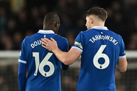 Everton pair Abdoulaye Doucoure and James Tarkowski.  (Photo by PAUL ELLIS/AFP via Getty Images)