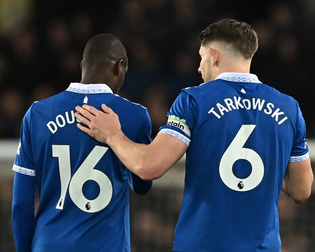 Everton pair Abdoulaye Doucoure and James Tarkowski.  (Photo by PAUL ELLIS/AFP via Getty Images)
