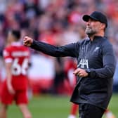 Jurgen Klopp manager of Liverpool celebrating with the fans at the end of the Premier League match between Liverpool FC and Tottenham Hotspur at Anfield on May 05, 2024 in Liverpool, England. (Photo by Andrew Powell/Liverpool FC via Getty Images)