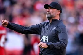 Jurgen Klopp manager of Liverpool celebrating with the fans at the end of the Premier League match between Liverpool FC and Tottenham Hotspur at Anfield on May 05, 2024 in Liverpool, England. (Photo by Andrew Powell/Liverpool FC via Getty Images)