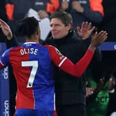 Michael Olise celebrates with manager Oliver Glasner after scoring in Crystal Palace's 4-0 win over Man Utd. (Photo by ADRIAN DENNIS/AFP via Getty Images)