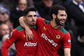  Rayan Ait-Nouri celebrates with Pedro Neto of Wolverhampton Wanderers scoring his team's second goal during the Premier League match between Chelsea FC and Wolverhampton Wanderers at Stamford Bridge on February 04, 2024 in London, England. (Photo by Richard Heathcote/Getty Images)