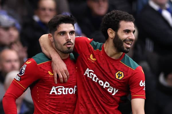  Rayan Ait-Nouri celebrates with Pedro Neto of Wolverhampton Wanderers scoring his team's second goal during the Premier League match between Chelsea FC and Wolverhampton Wanderers at Stamford Bridge on February 04, 2024 in London, England. (Photo by Richard Heathcote/Getty Images)