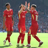  Alexis Mac Allister of Liverpool celebrates after scoring the opening goal during the Premier League match between Liverpool FC and Wolverhampton Wanderers at Anfield on May 19, 2024 in Liverpool, England. (Photo by John Powell/Liverpool FC via Getty Images)