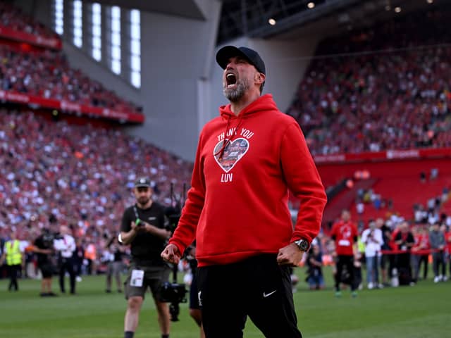 Jurgen Klopp manager of Liverpool celebrating with the fans at the end of the Premier League match between Liverpool FC and Wolverhampton Wanderers at Anfield on May 19, 2024 in Liverpool, England. (Photo by Andrew Powell/Liverpool FC via Getty Images)