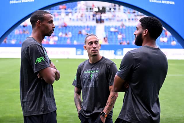 Joel Matip, Kostas Tsimikas and Joe Gomez of Liverpool checking out the pitch before the pre-season friendly match between Karlsruher SC and Liverpool FC at BBBank Wildpark on July 19, 2023 in Karlsruhe, Germany. (Photo by Andrew Powell/Liverpool FC via Getty Images)