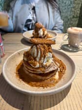 The Vibe is a fully vegan cafe offering two tasty pancake options, including the Biscoff and banana stack. The venue has a Google rating of 4.9 stars from 700 reviews.