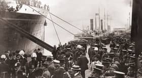 August 1910:  Soldiers of the Canadian Queen's Rifles crowd the quay of Liverpool Docks