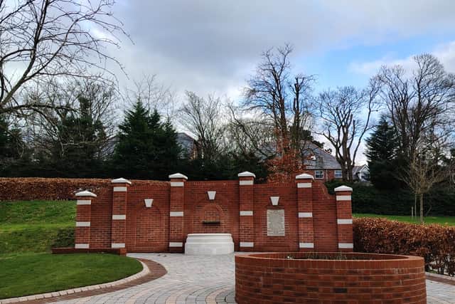Work progresses on the memorial rose garden for Sir George Martin at Strawberry Field, Liverpool.