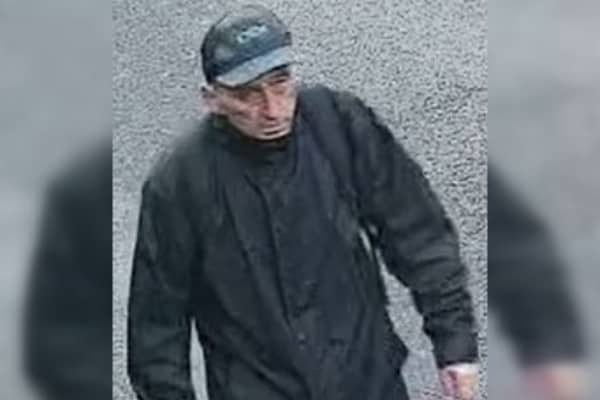Merseyside Police have released CCTV images of a man who could have information following a burglary at a school in St Helens.
