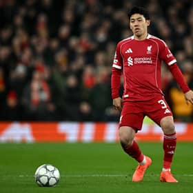 Liverpool's Japanese midfielder #03 Wataru Endo passes the ball during the UEFA Champions League football match between Liverpool and Qarabag at Anfield in Liverpool, north west England on January 28, 2026. (Photo by Paul ELLIS / AFP via Getty Images)