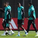 Alexander Isak of Liverpool speaks to team mate Ryan Gravenberch during the Liverpool FC Training Session and Press Conference ahead of their UEFA Champions League 2024/25 Quarter-Finals First Leg match against Paris Saint-Germain at AXA Training Centre on April 07, 2026 in Kirkby, England.  (Photo by Jan Kruger/Getty Images)