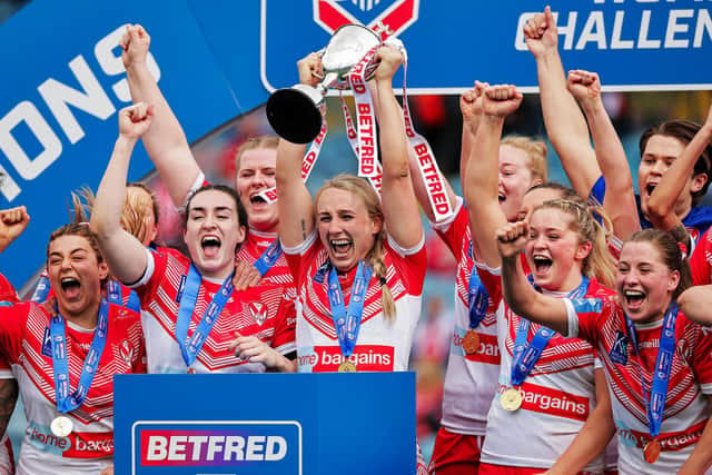 <p>St Helens captain Jodie Cunningham and team-mates celebrate with the Betfred Women's Challenge Cup trophy. Picture: Alex Whitehead/SWpix.com.</p>