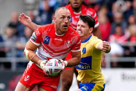 St Helens' James Roby (left) is tackled by Hull Kingston Rovers' Lachlan Coote. Picture: PA