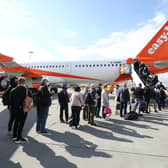 Library image of passengers prepare to board an easyJet. 