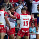 St Helens' Konrad Hurrell (second left) celebrates scoring his side's fourth try against his former club Leeds Rhinos. Picture: Martin Rickett/PA Wire.