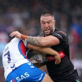 Impact: Wakefield Trinity's Mason Lino tackles St Helens' Curtis Sironen. Picture: Zac Goodwin/PA Wire.