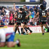 Golden moment: St Helens players celebrate Jack Welsby's golden point drop goal. Pictures: Zac Goodwin/PA Wire.