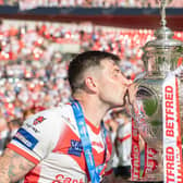 Mark Percival kisses the Challenge Cup trophy after St Helens' victory in 2021. (Picture: SWPix.com)