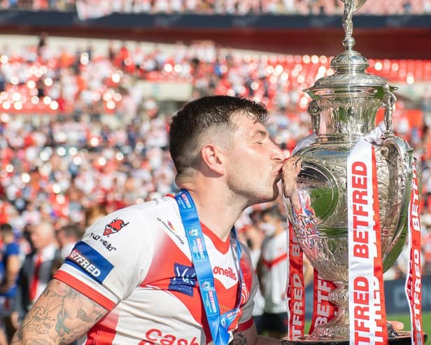 Mark Percival kisses the Challenge Cup trophy after St Helens' victory in 2021. (Picture: SWPix.com)