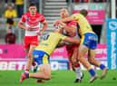 St Helens' James Roby is tackled by Hull KR's George King and Jimmy Keinhorst. Picture by Alex Whitehead/SWpix.com