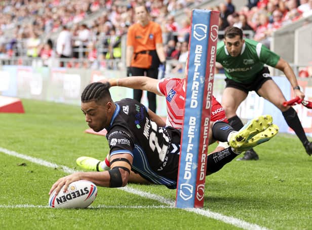 <p>Wakefield Trinity's Lewis Murphy scores his fourth try against St Helens Picture by Paul Currie/SWpix.com</p>