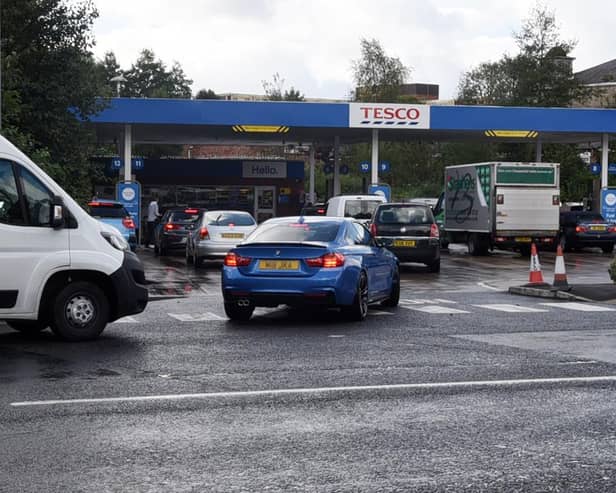 Queues this afternoon at a Tesco petrol station. 
