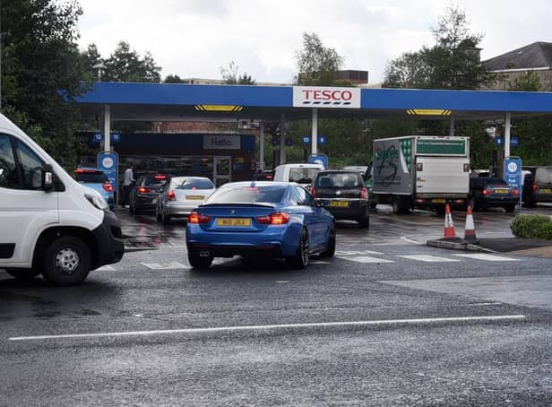 <p>Queues this afternoon at a Tesco petrol station. </p>