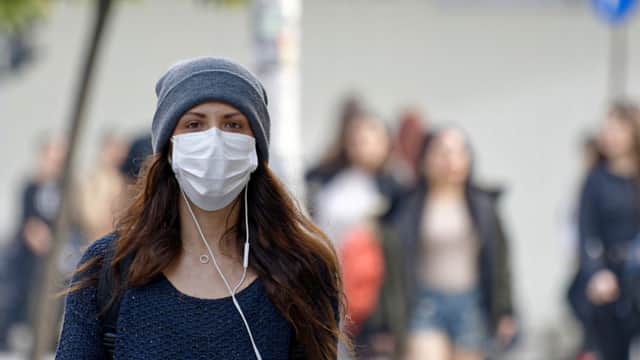 <p>Face masks are now mandatory in shops and on public transport. </p>