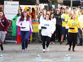 Action from the 2019 Horsham Charity Pancake Races. Picture by Derek Martin Photography and Art