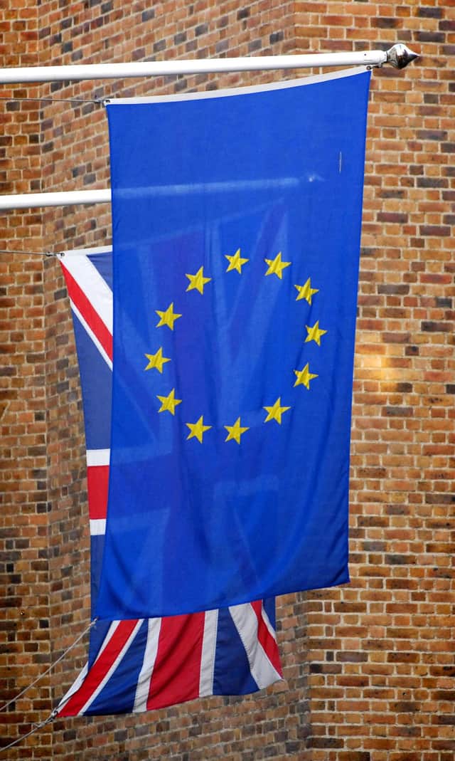 The Union Jack pictured behind the European Union flag in London.