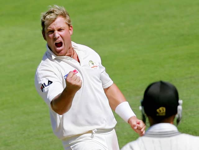 Australian spinner Shane Warne punches the air after dismissing New Zealand batsman Chris Martin as he takes five wickets on the fourth day of the first Test between the sides in 2005. Picture: William West/AFP via Getty Images