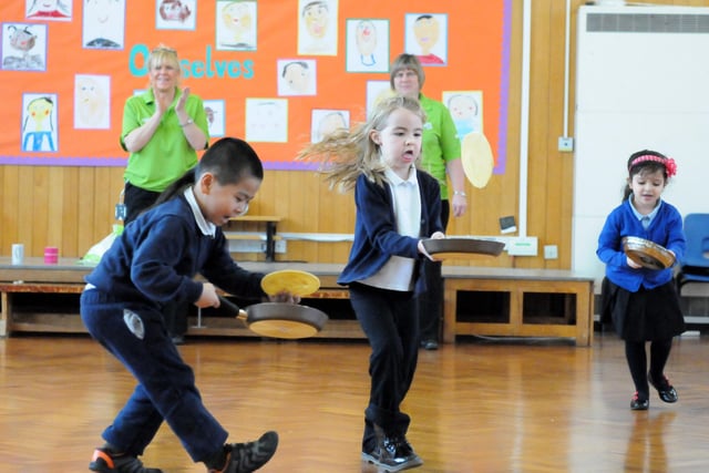 Laygate Community School pupils held pancake races with the help of Mavis Maughan and Tracey Tough from Asda in 2014.
