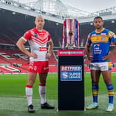 Rhinos captain Kruise Leeming and James Roby, of Saints, with the Super League trophy at Old Trafford. Picture by Allan McKenzie/SWpix.com.