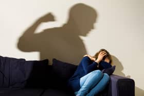 PICTURE POSED BY MODEL File photo dated 09/03/15 of a shadow of a man with a clenched fist as a woman cowers in the corner, as almost 100 domestic abuse incidents were reported to police on Christmas Day last year.